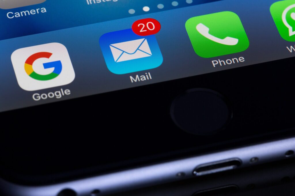 An image of a mail inbox app icon on a smartphone screen
