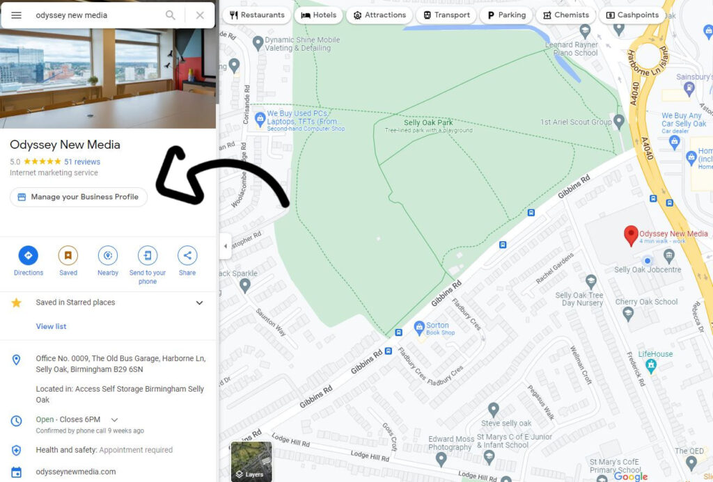 An image of the Odyssey location on Google Maps with an arrow pointing to manage business
