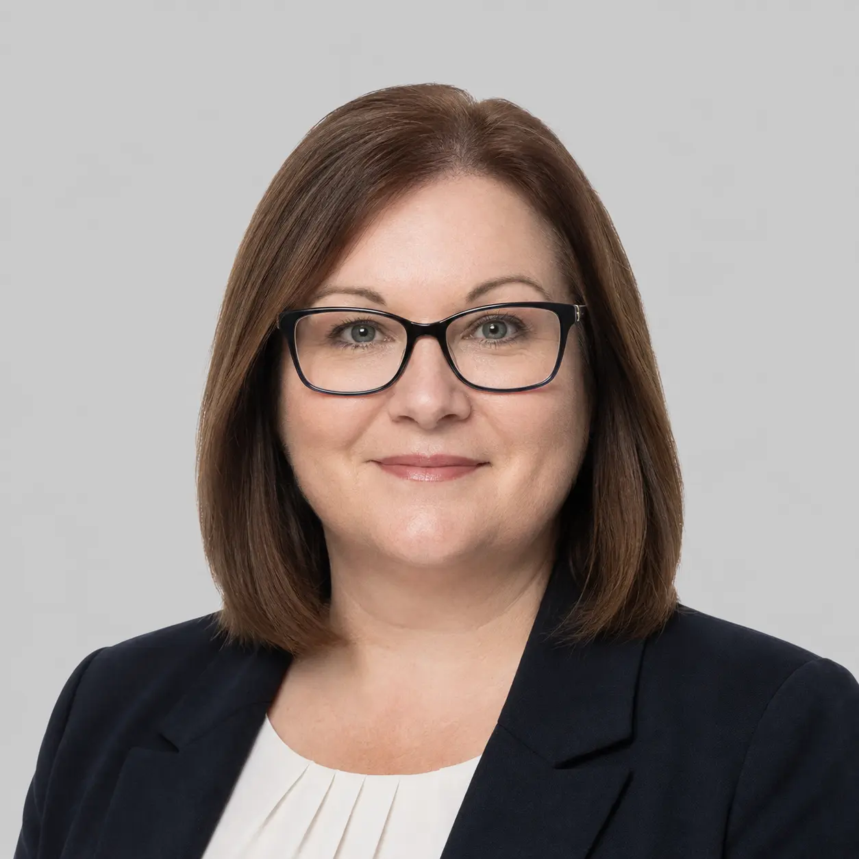 Helen our Credit Control Officer - slightly plump, middle-aged woman, glasses, accountancy lady.